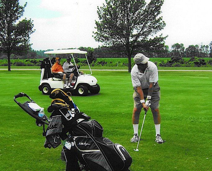  Glenn McKenzie lays up and plays safe on the infamous #14